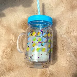 Jug with lid and straw